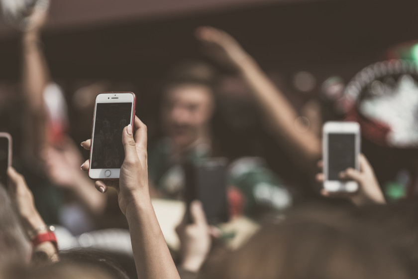 NTELogic.com | Image of people holding smart phones